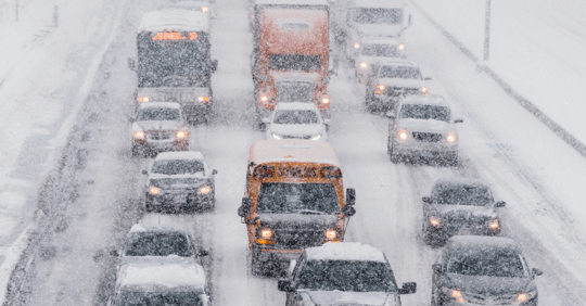 Cars, Trucks, and Busses in Snow