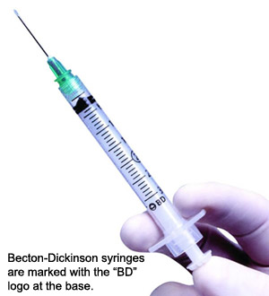 Becton-Dicksinson syringes are marked with a "BD" logo at the base.